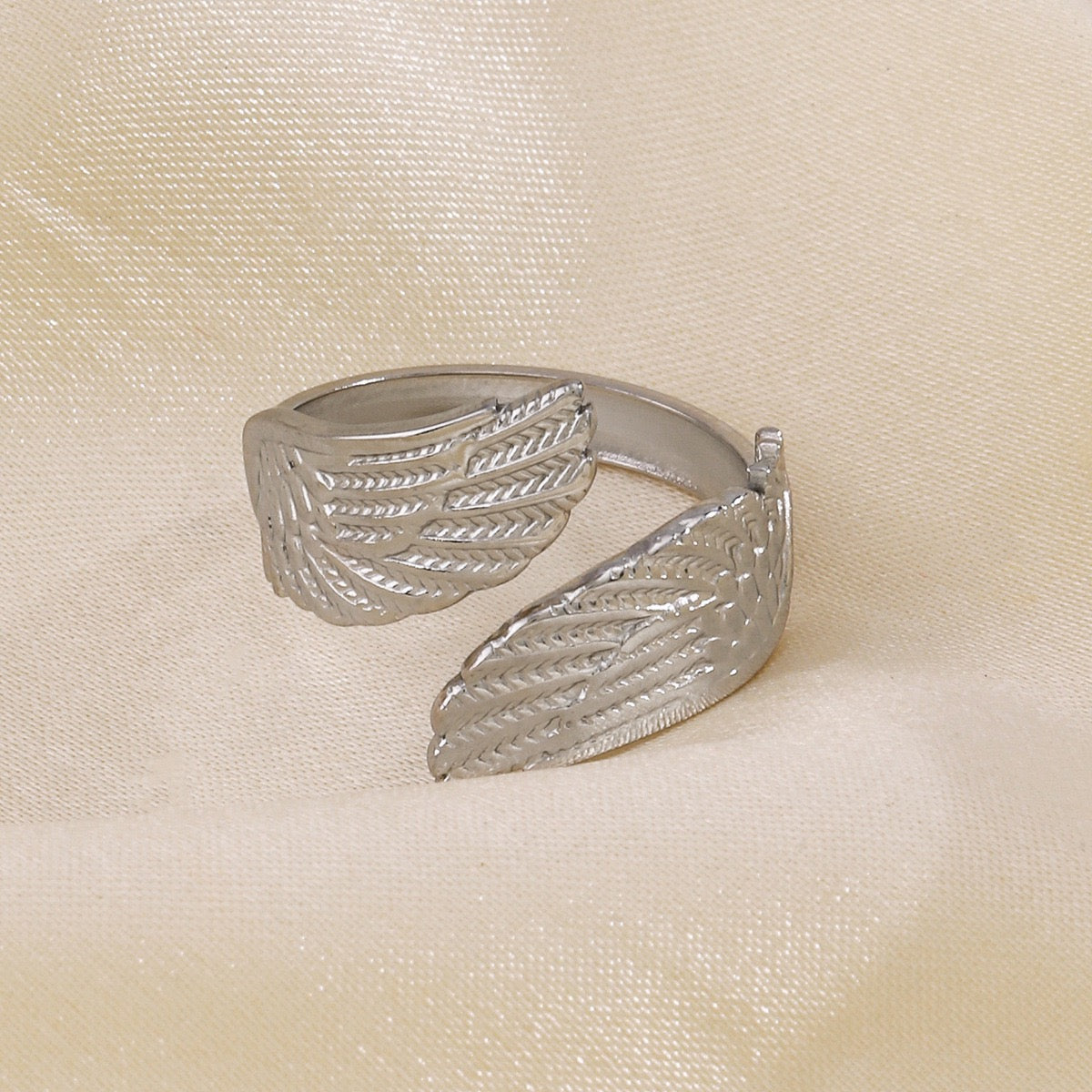 Angel wings design “ inner strength”adjustable open ring stainless steel water resistant tarnish free